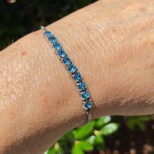 Blue topaz crystal bolo bracelet adjustable to 8.5 in